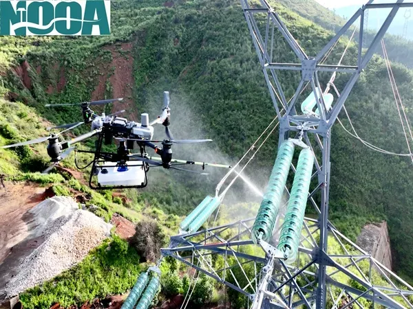 clean high voltage insulators of live transmission lines with drones